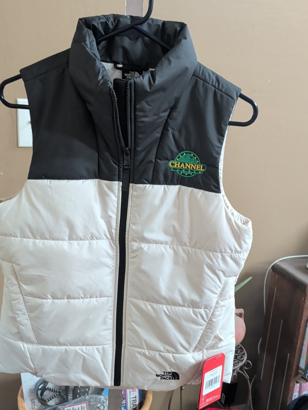 The North Face Black and Cream Puffer Vest with Channel Patch